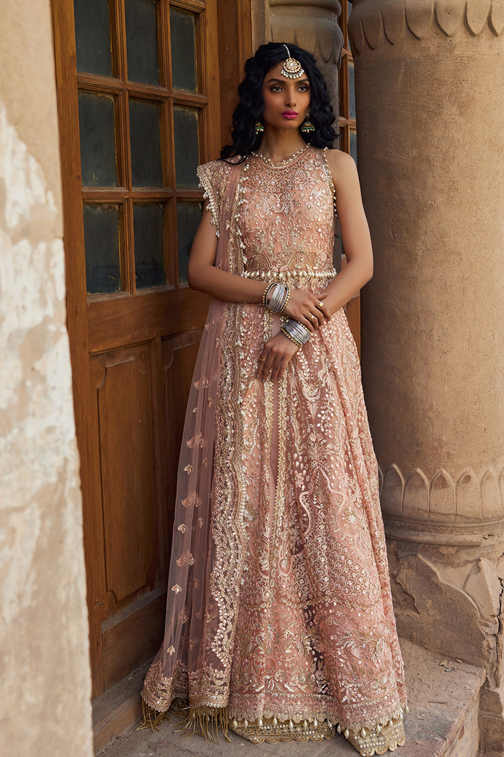 Net Fabric Peach Color Embroidered Wedding Wear Designer Lehenga Choli